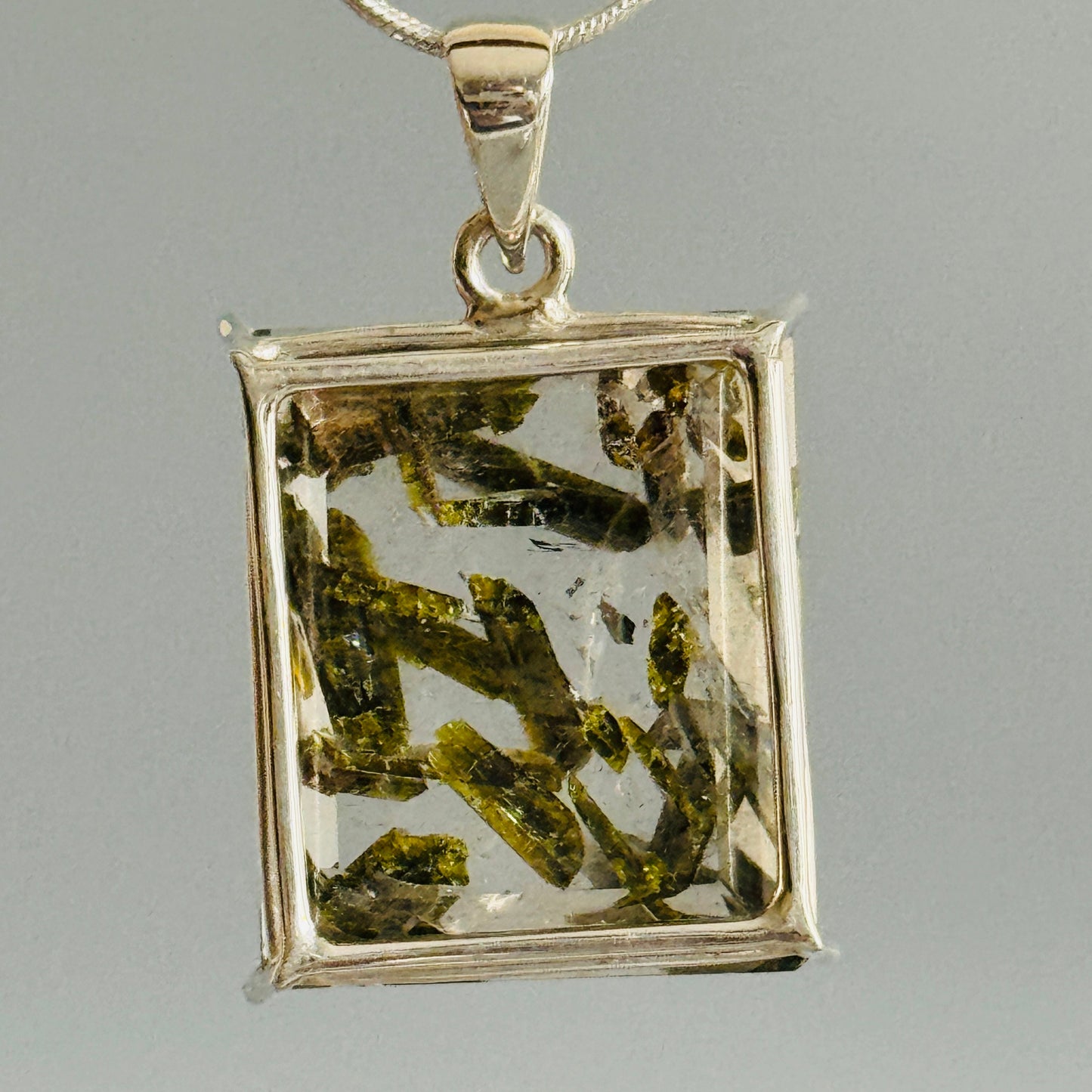 Epidote in Quartz Pendant