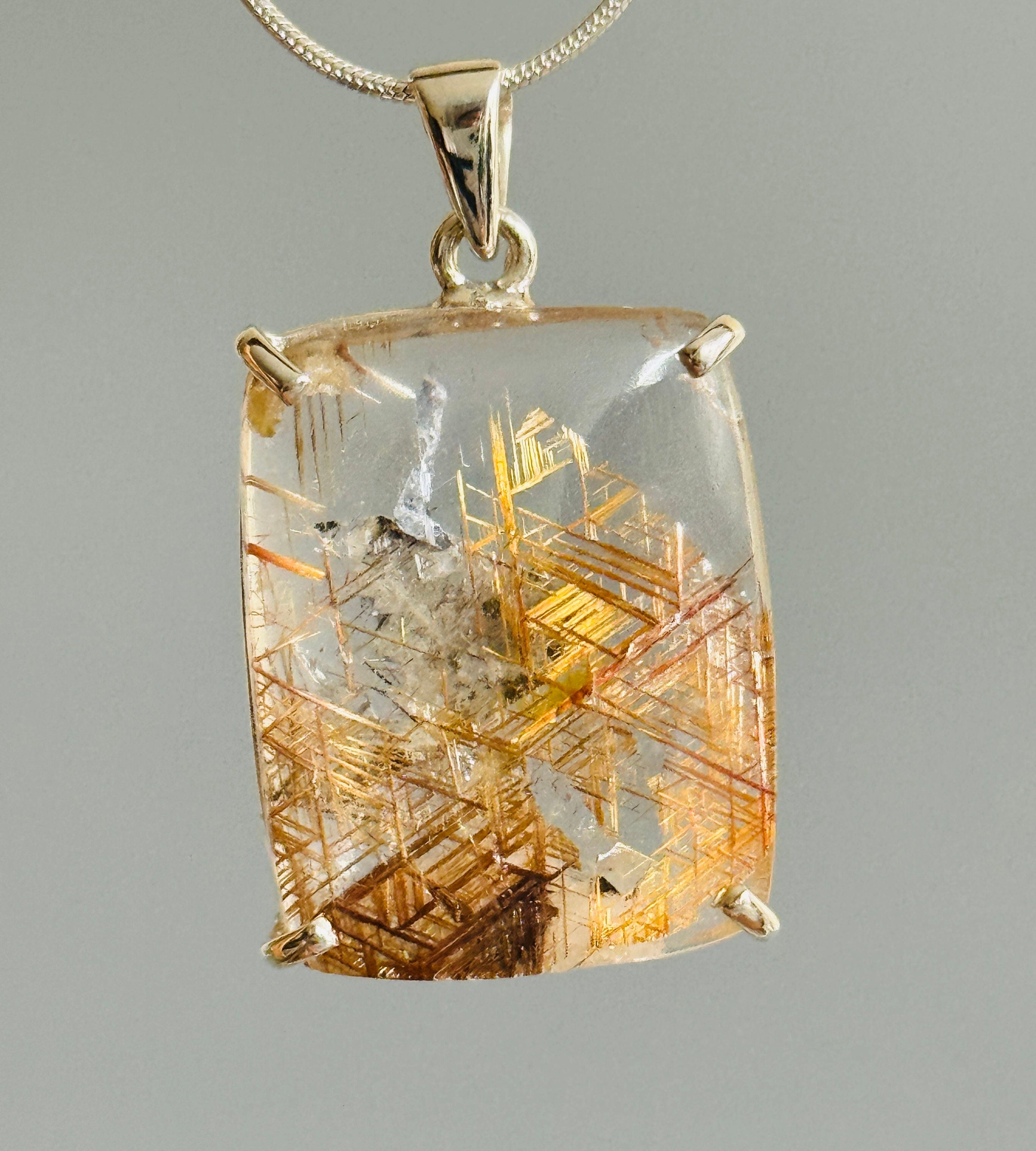 Abstract Rutilated Quartz deals Snake Pendant